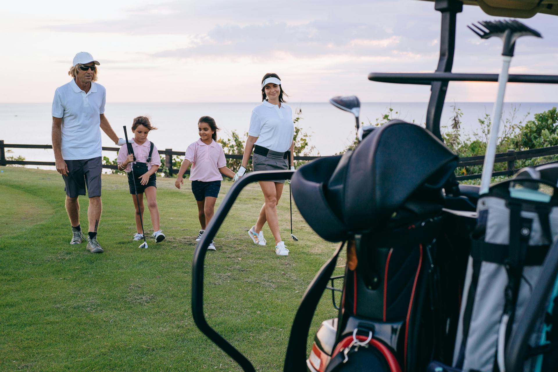 Parent and child playing golf together at Glen Eagle